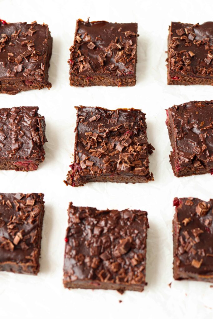 9 brownie pieces on white background.