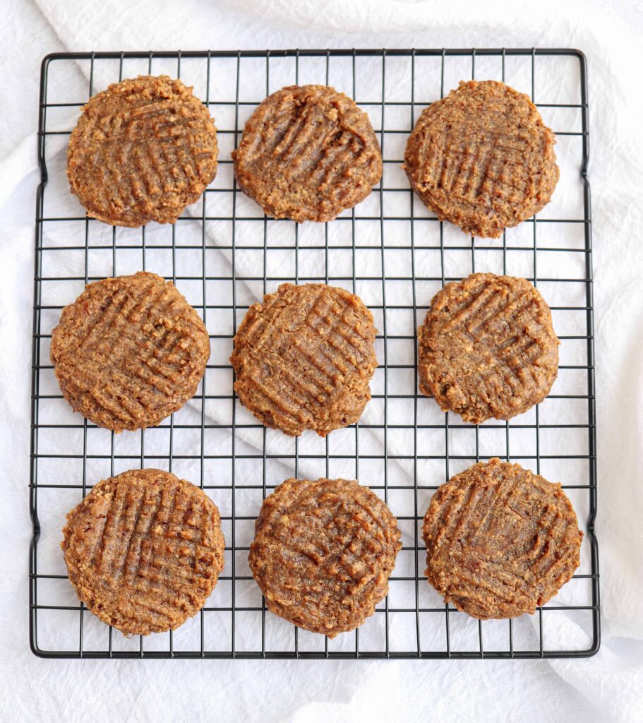 none flourless peanut butter banana cookies on a cooling rack