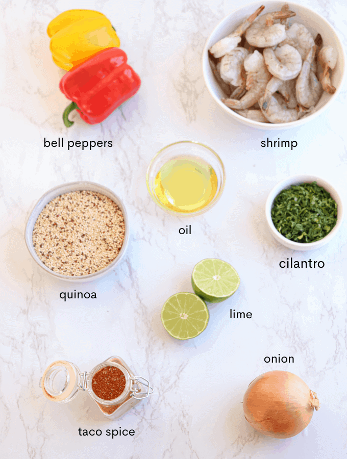 shrimp fajita bowl ingredients laid out on white counter