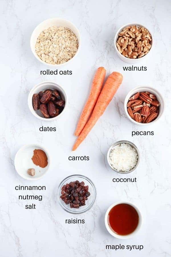 carrot cake bars ingredients on white marble background