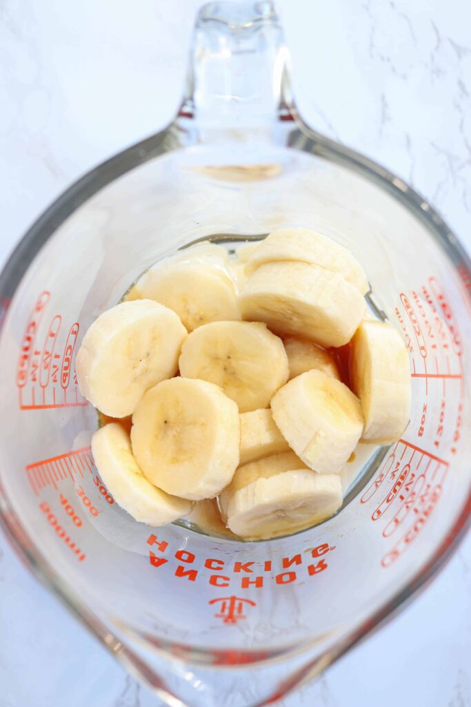 sliced bananas in a measuring jug.