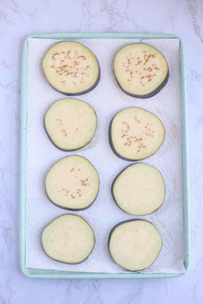 eggplant slices on paper towels.