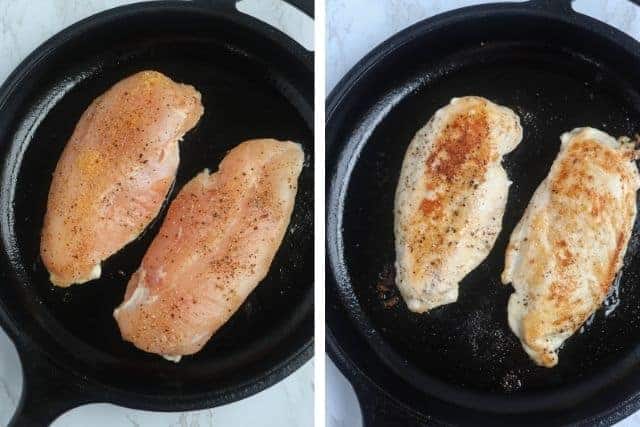 cooking chicken breasts in an iron skillet.