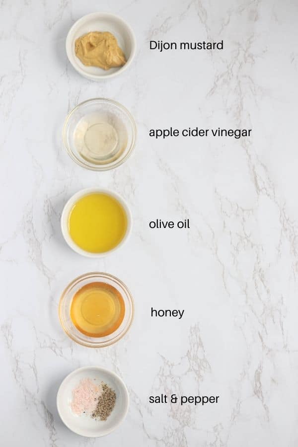 small round bowls with ingredients for making salad dressing with captions.