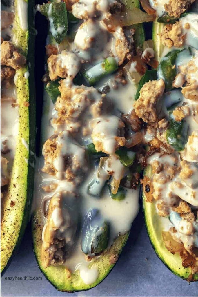 zucchini boats stuffed with ground meat, green peppers and cheese.