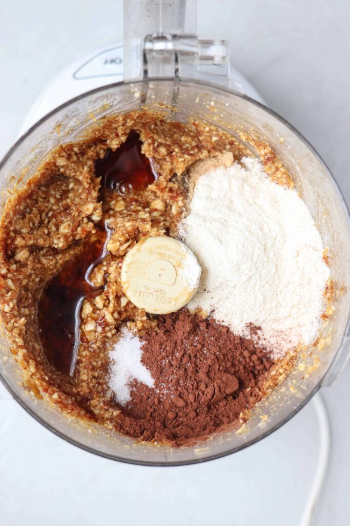 making chocolate bliss balls in a food processor.