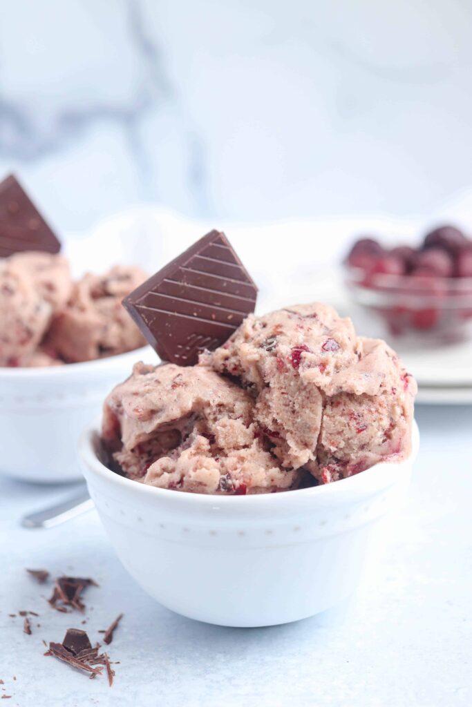 chocolate cherry nice cream in a small white bowl.