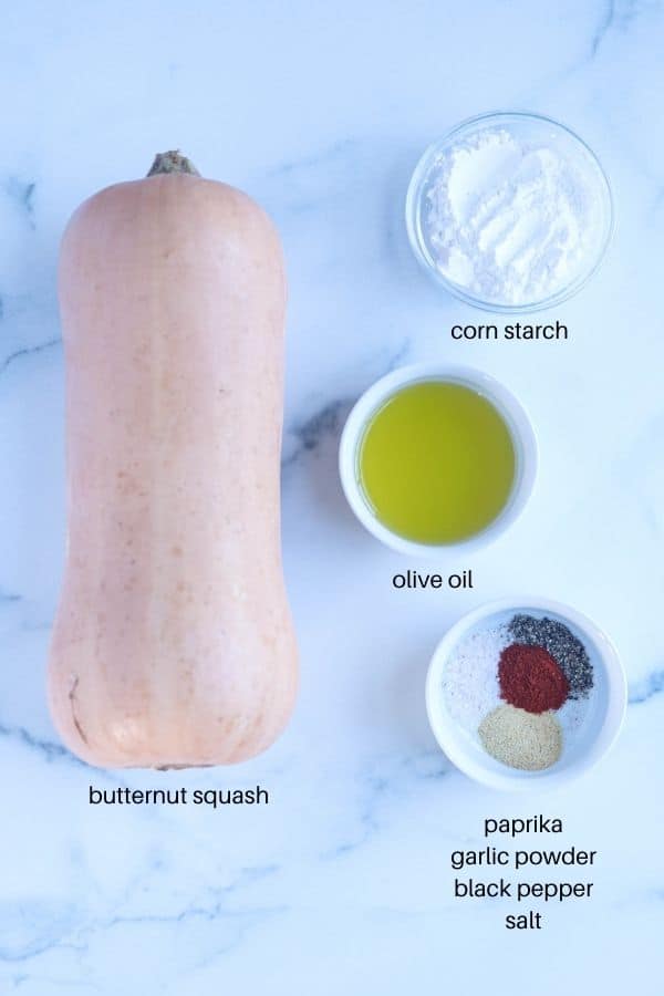 ingredients for making butternut squash fries in the air fryer with captions.