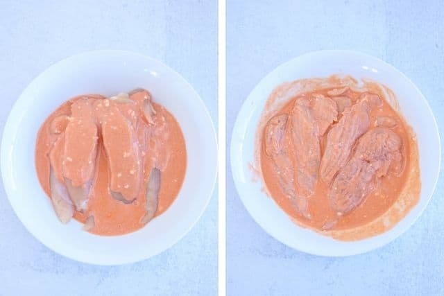 raw chicken tenders marinaded in Buffalo sauce 