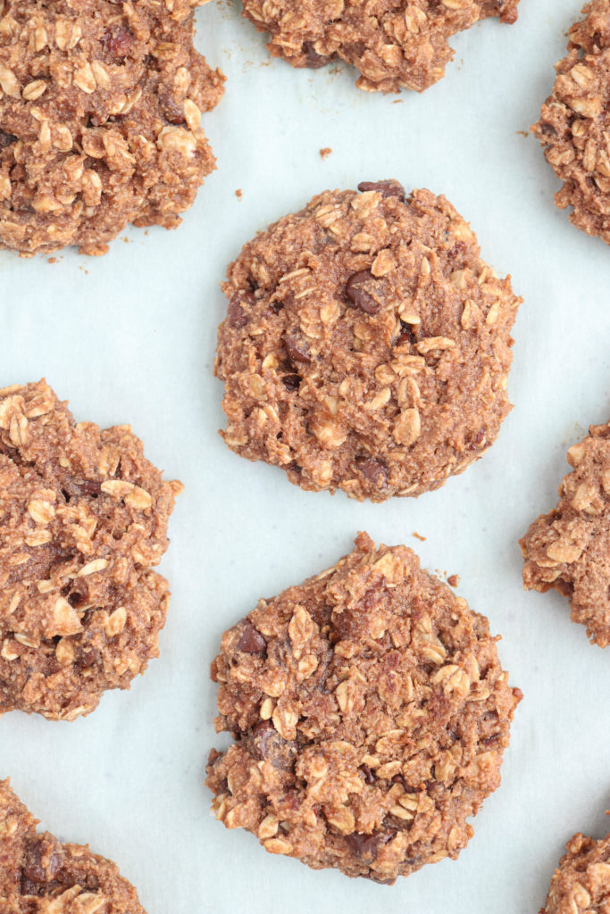 banana Nutella oatmeal cookies after baking on white parchment paper