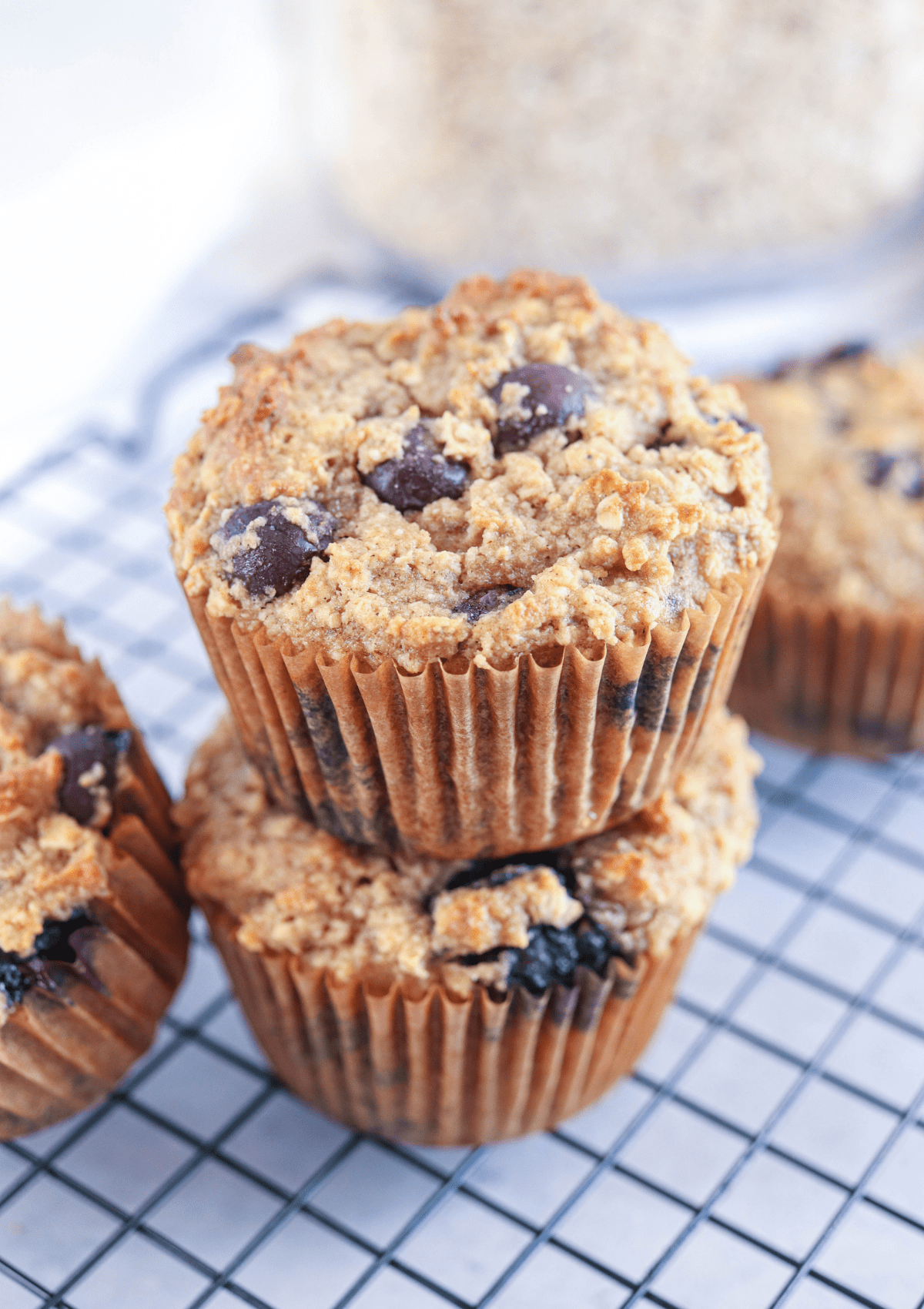 banana blueberry oatmeal muffins on a cooling rack.