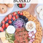 smoked salmon charcuterie board pin with title.