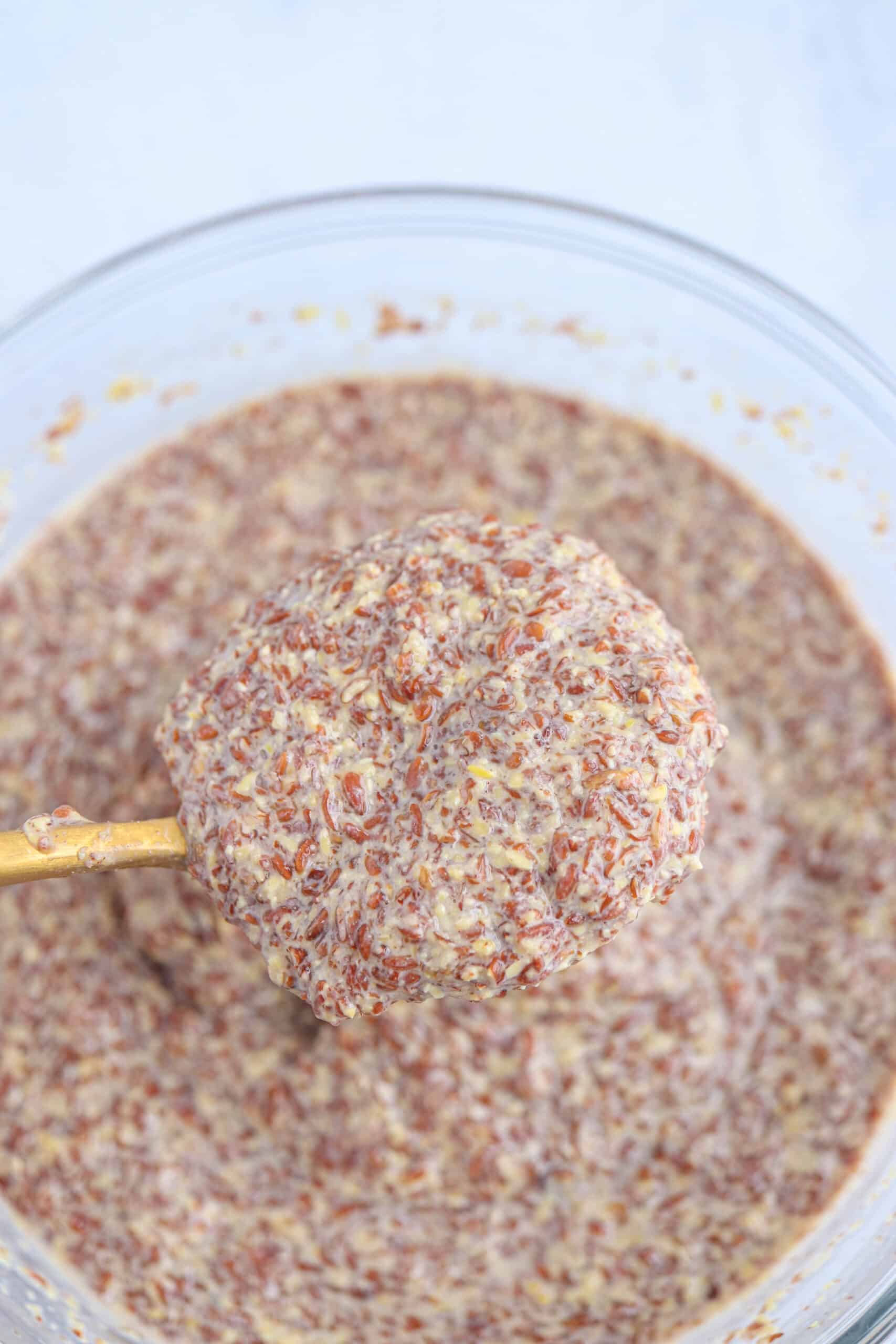 flaxseed pudding close up on a golden spoon.