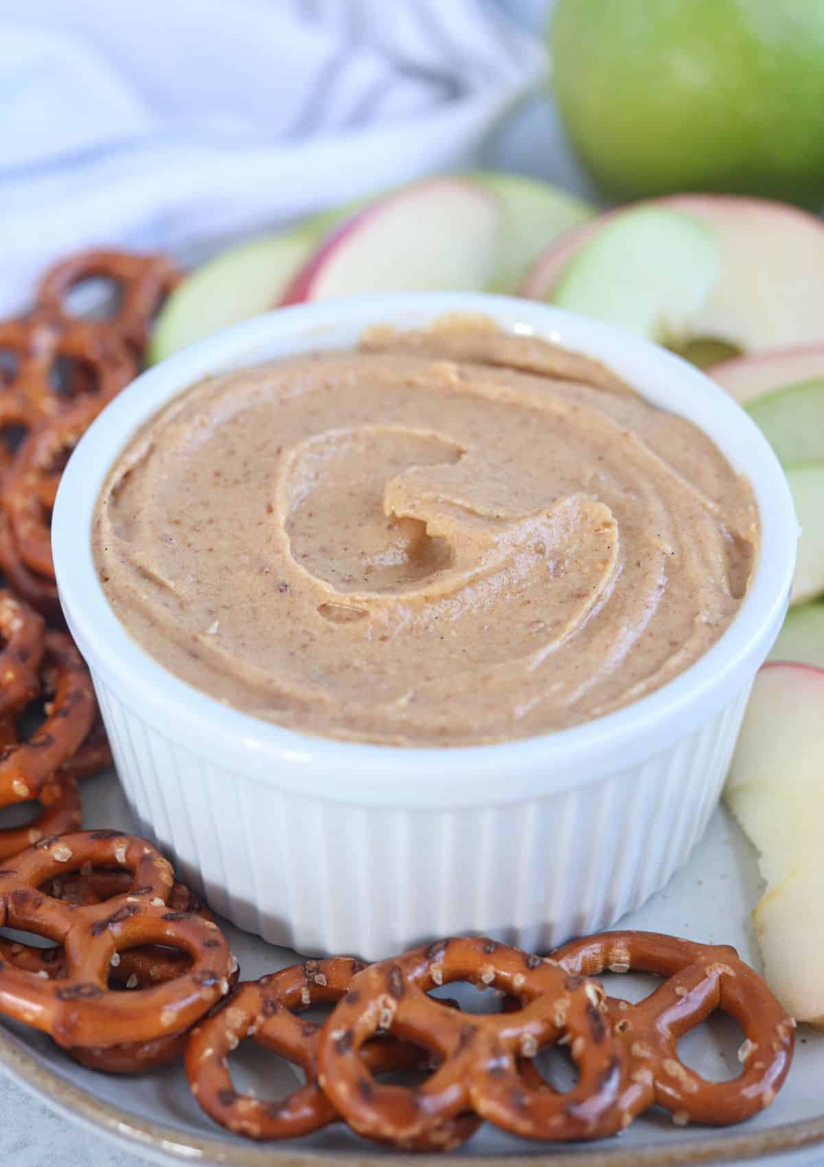 healthy yogurt caramel dip in a white ramekin.