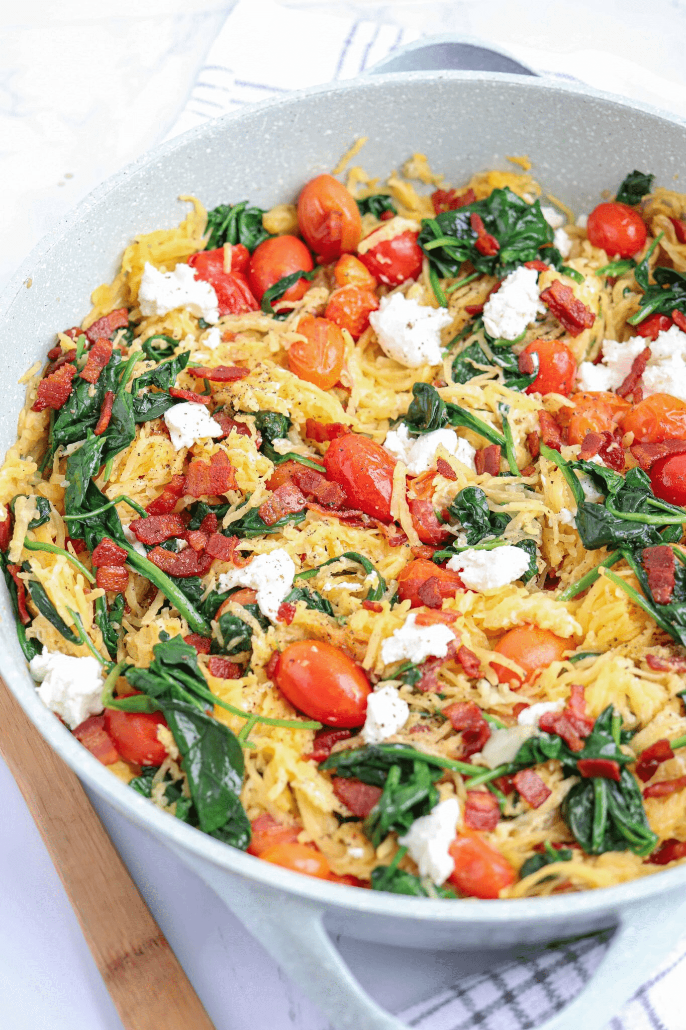 spaghetti squash with spinach, cherry tomatoes, goat cheese and bacon.