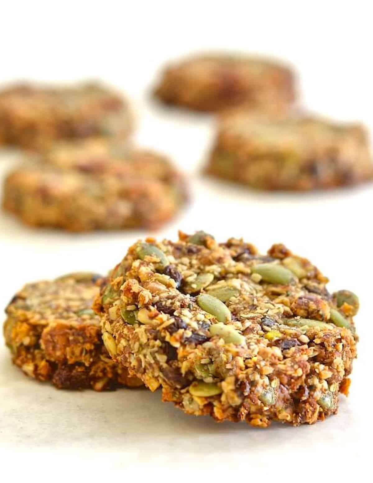 seeded banana cookies on white surface.