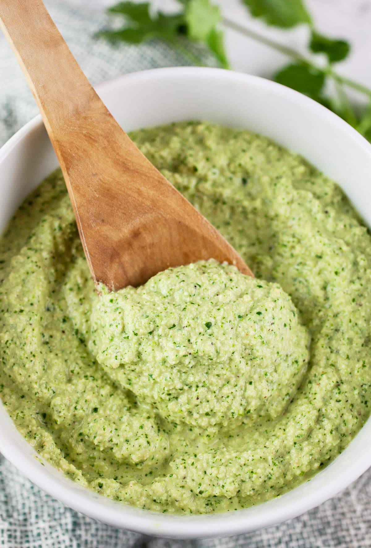 cashew cilantro sauce in a white bowl.