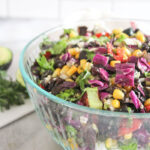 Mexican chopped salad in a glass bowl.
