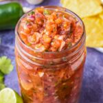 fresh tomato salsa in a mason jar.