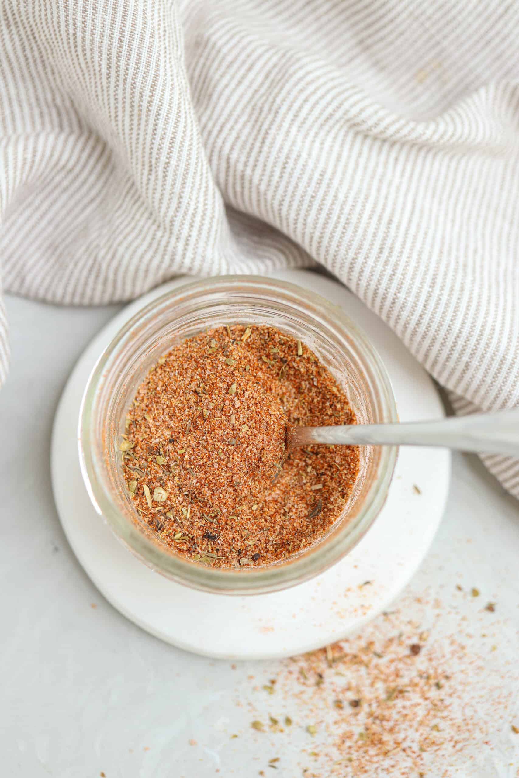 homemade cajun seasoning blend in a small jar.