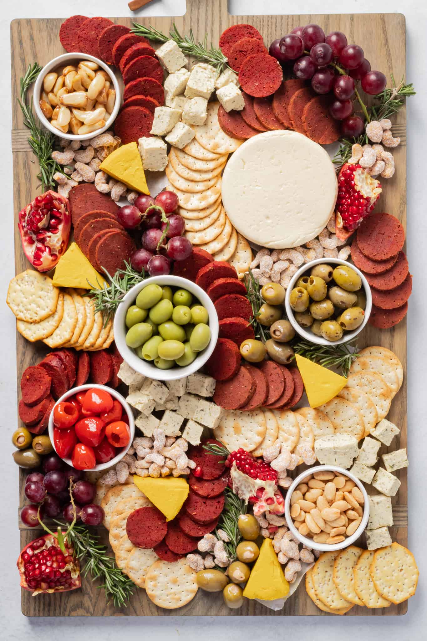 vegan charcuterie board feturing vegan meats and cheeses.