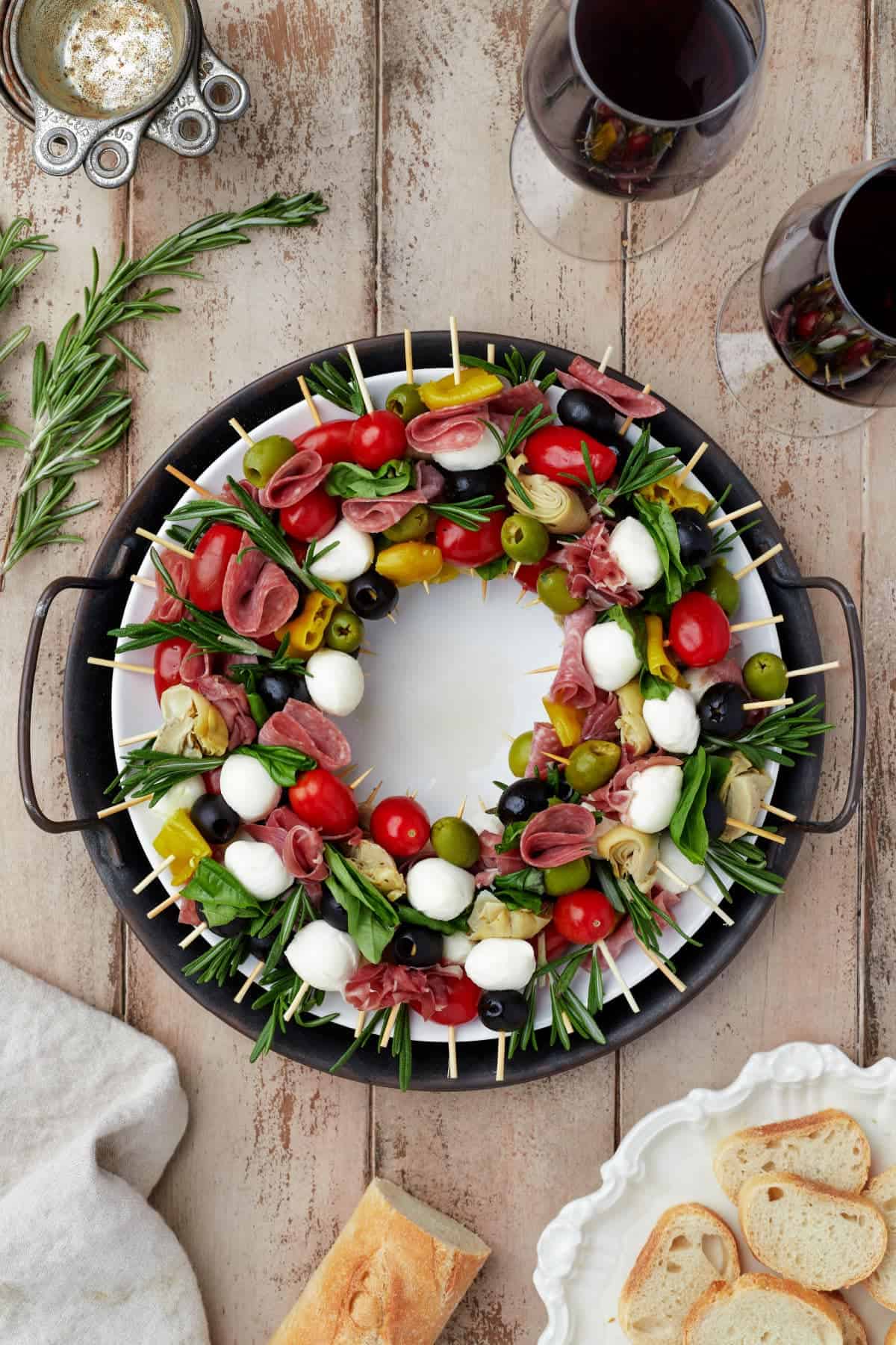 charcuterie skewers arranged in a wreath.
