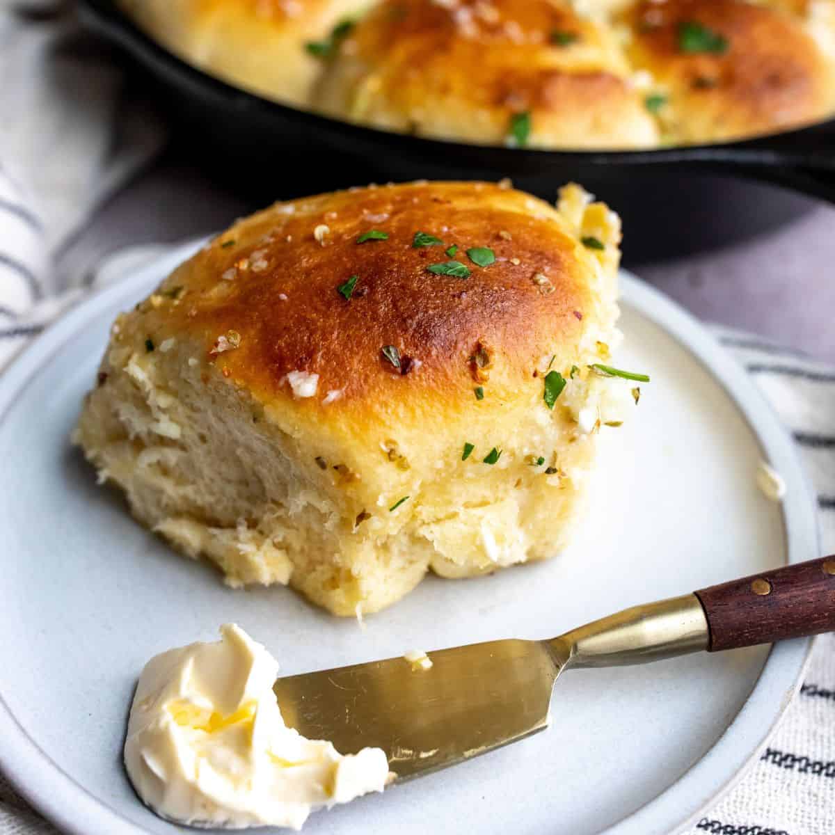 soft garlic roll on a plate.