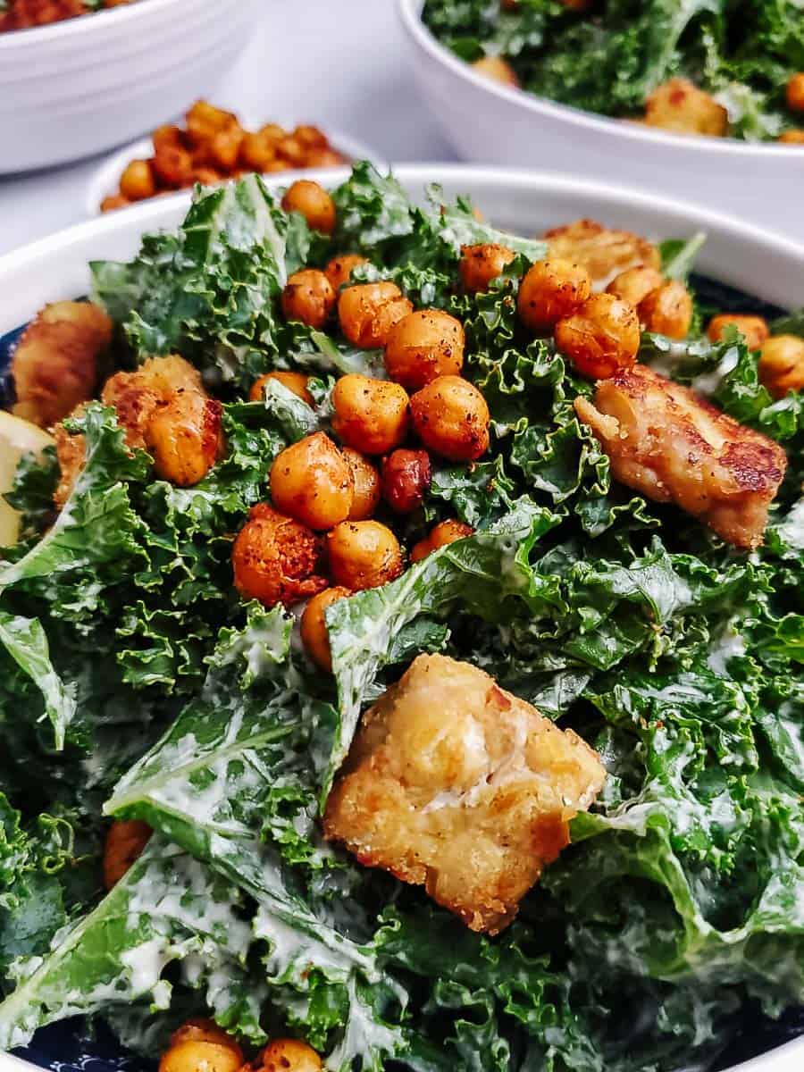 kale caesar salad with chickpeas and tempeh.