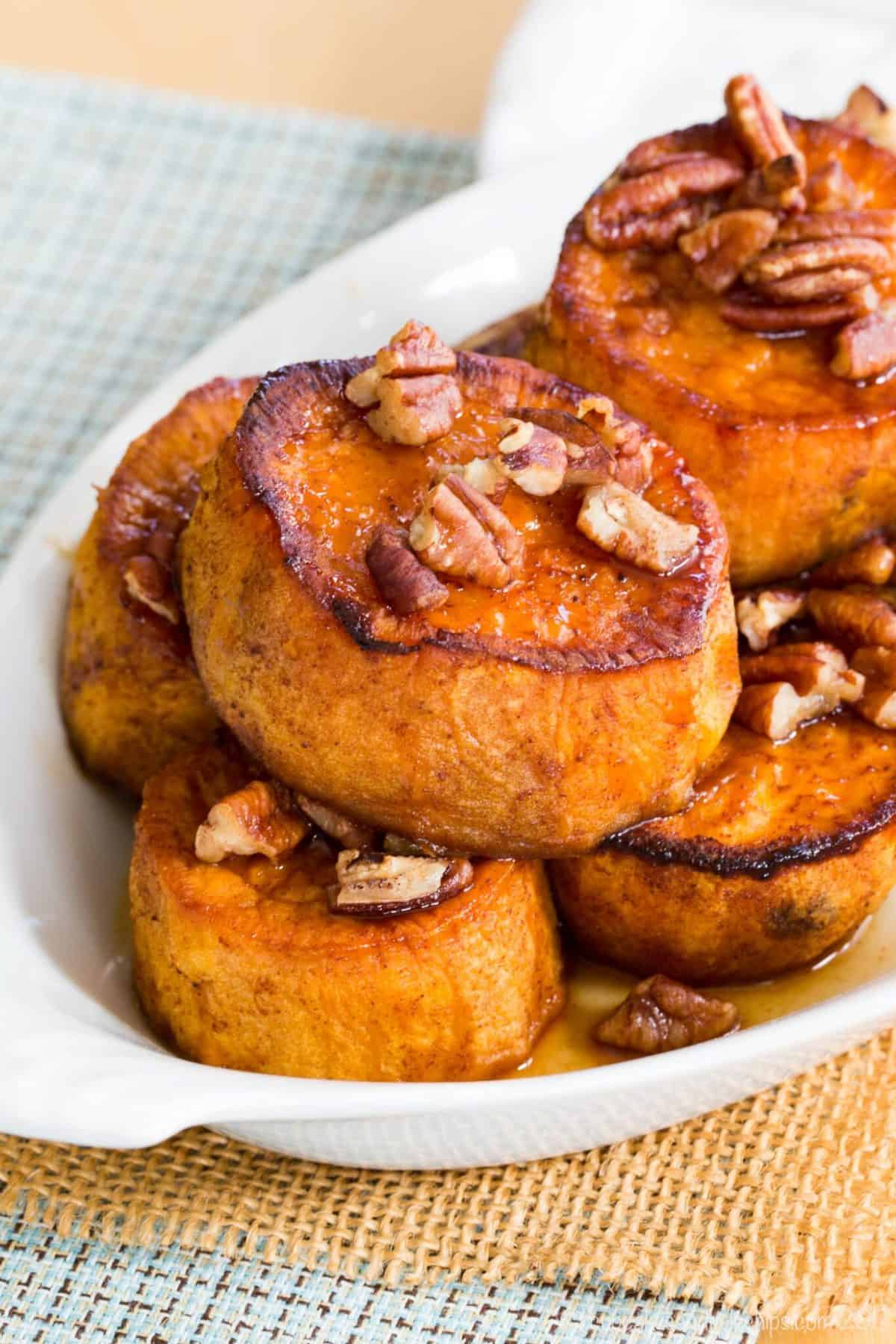 thick slices of melting sweet poatoes with pecans.