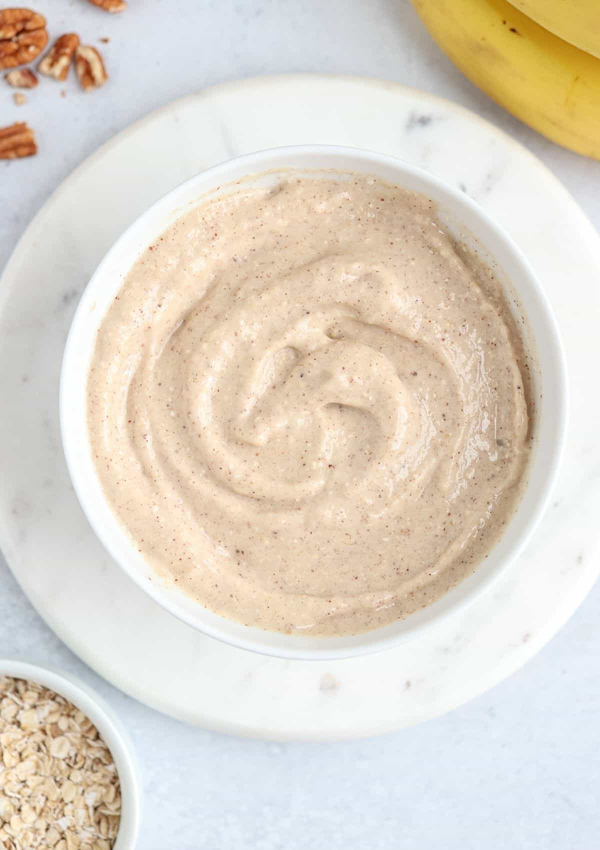 oatmeal smoothie bowl in a white bowl. 