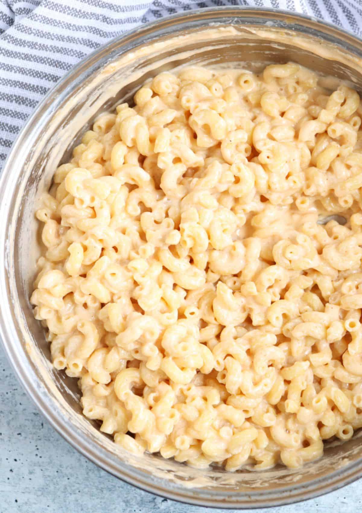 macaroni and cheese in a steel pot.