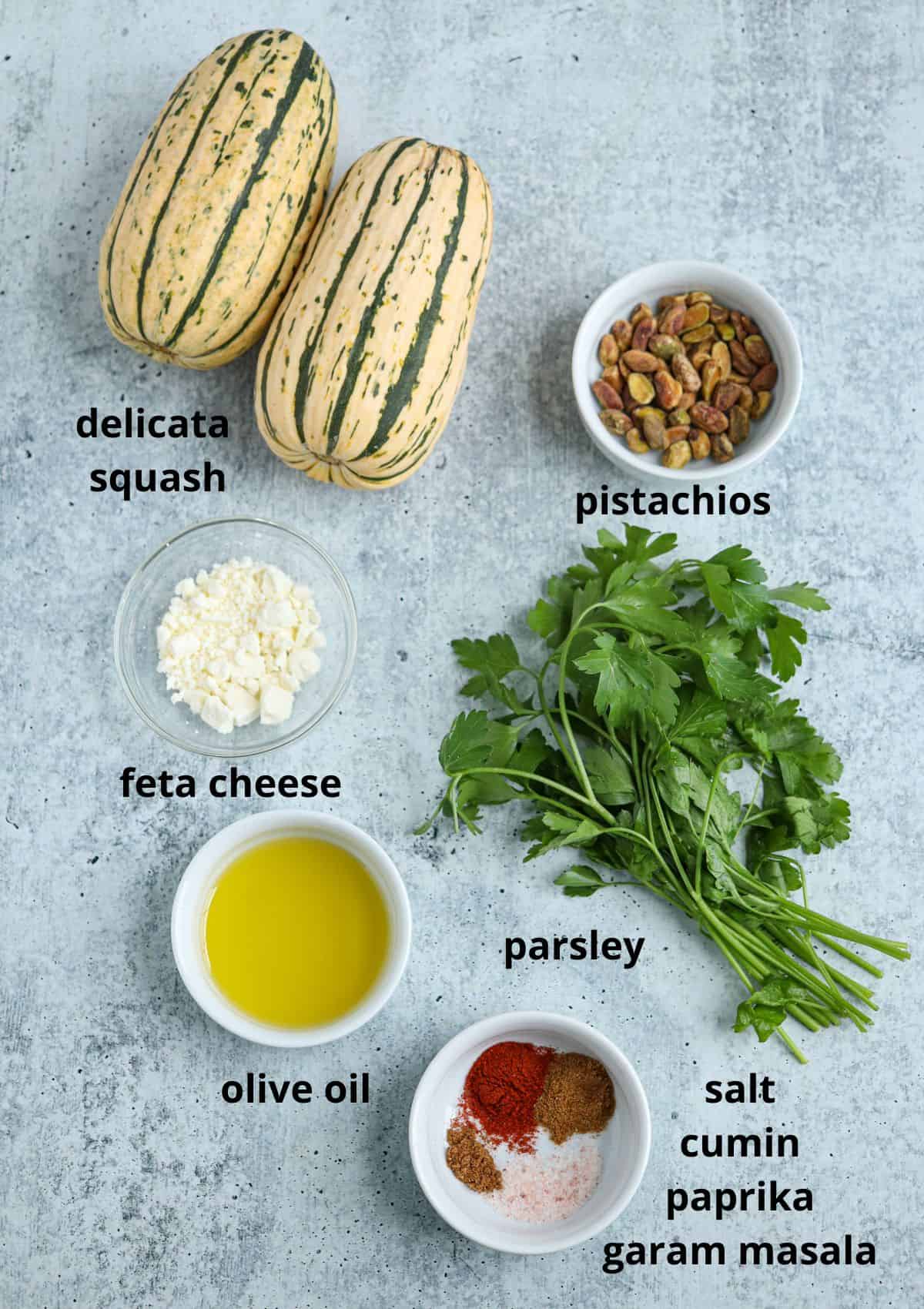 ingredients for making sautéed delicata squash on gray background with captions. 