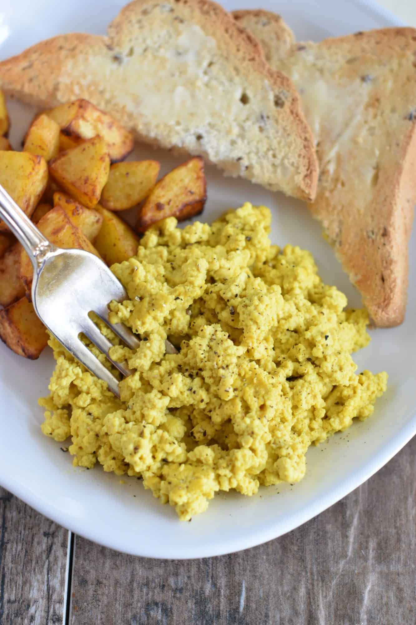tofu scramble with home fries and toast.