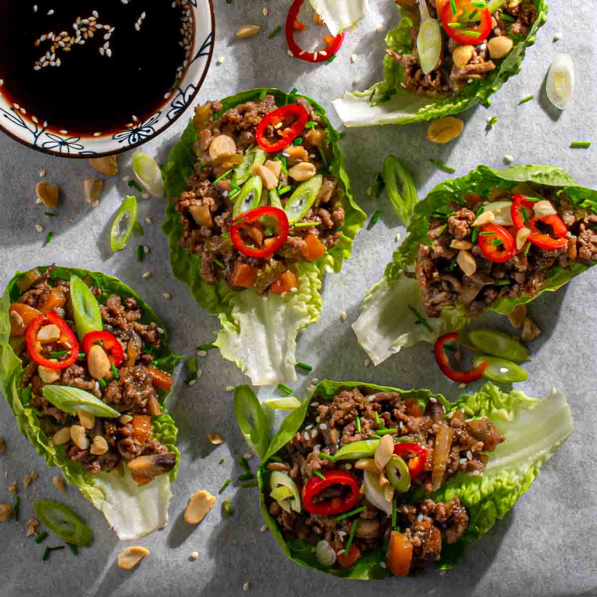Chinese letuce cups with chili peppers and green onions. 