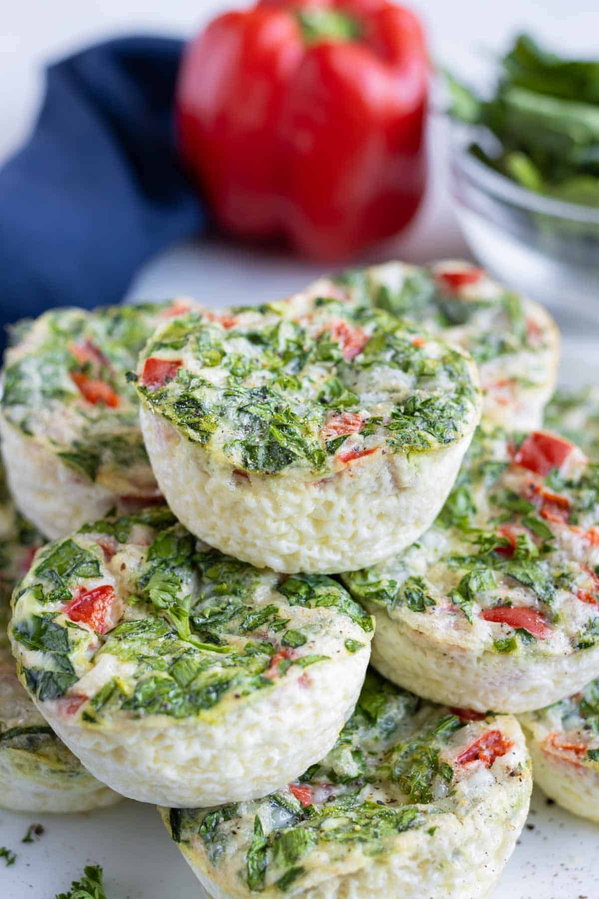 egg white bites with spinach and red peppers.