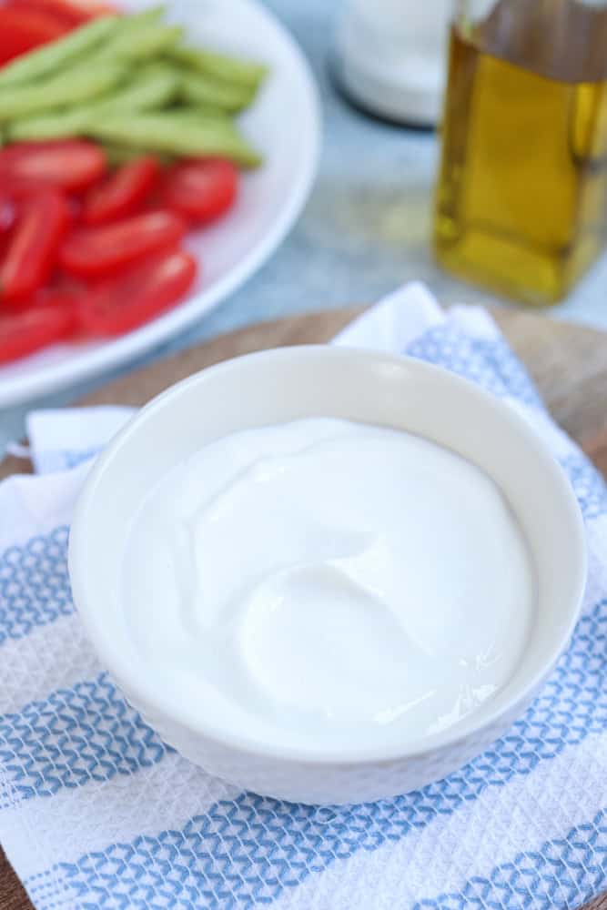 blended cottage cheese in a white bowl.