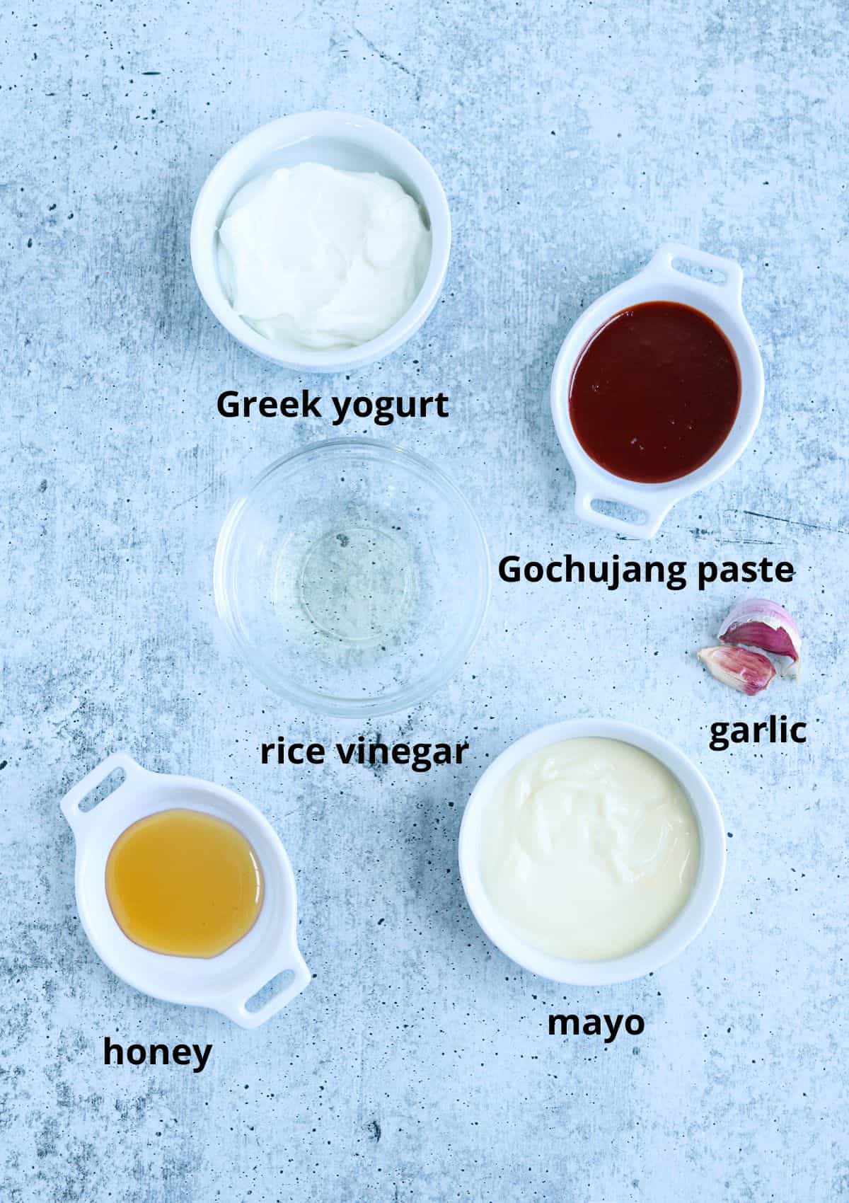 Ingredients for making gochujang aioli with captions.
