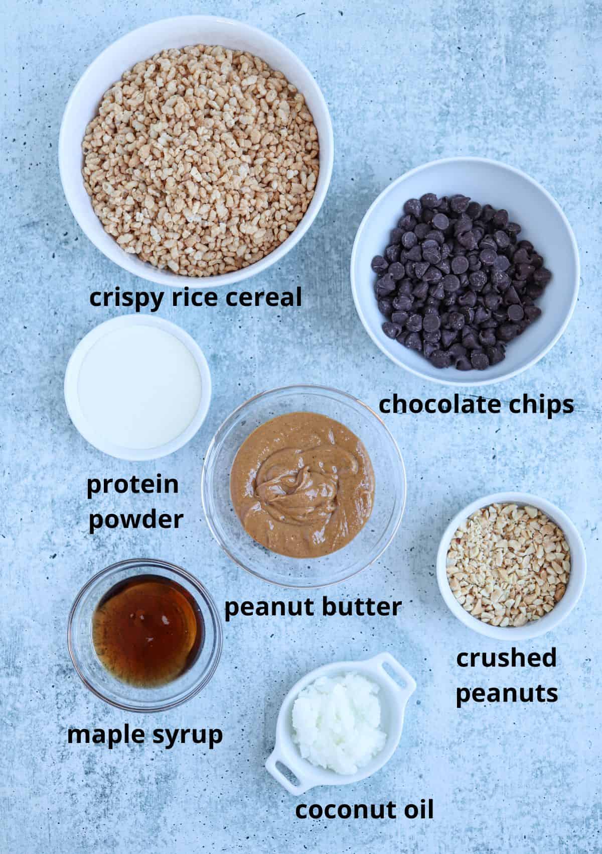 ingredients for making chocolate peanut butter protein bars with captions.