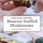A hand holding a delicious Boursin stuffed mushroom with a tray of these savory bites in the background. Text on image reads: Quick & Easy Appetizer: Boursin Stuffed Mushrooms with a website URL.